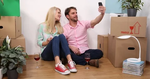 Happy Owner Couple Show Home Apartment Keys Talk Online Conference Mobile Phone Stock Footage