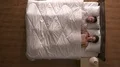 The happy pair wake up in the bed. view from above 4k or 4k+ Resolution