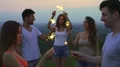 The happy people hold bengal lights. slow motion. evening time 4k or 4k+ Resolution