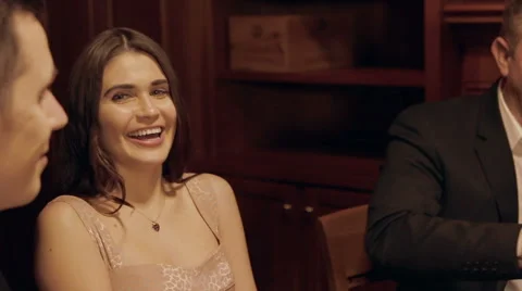 Happy player laughs as she makes her move Stock Footage 42894857
