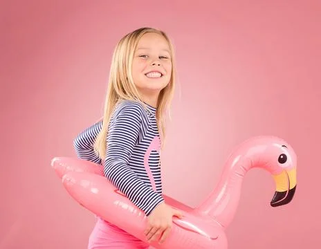 Happy, portrait and pool float with girl in studio for swimming, summer break or 스톡 사진