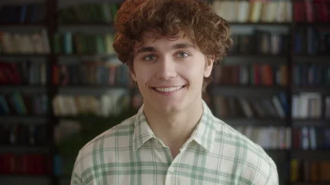 Happy Positive Man Laughing at Funny Joke Looking at Camera in Library. Cheerful Видео 171946053
