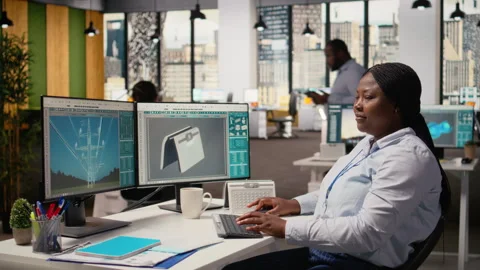 Happy product developer in office using advanced solar cell technology Stock Footage 316002301