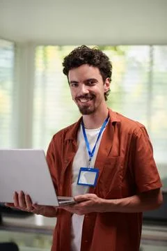 Happy Programmer with Opened Laptop Stock Photos