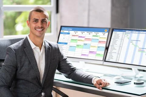 Happy Project Manager In Office Using Cloud Software Foto stock