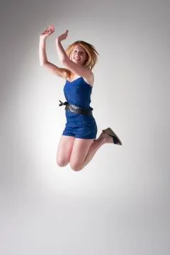 Happy redhead jumping Stock Photos