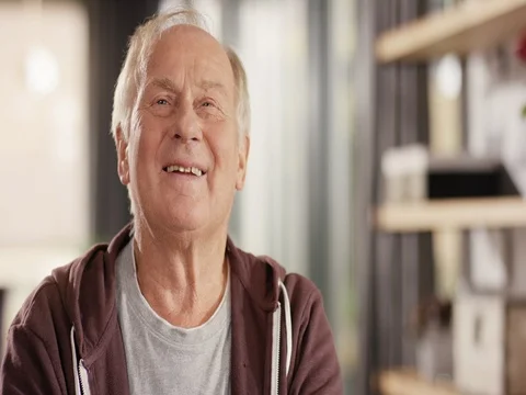 Happy Retiree smiling into Camera Stock Footage 82178047