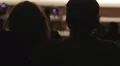 Happy romantic couple hugging while watching concert, enjoying leisure together HD Footage