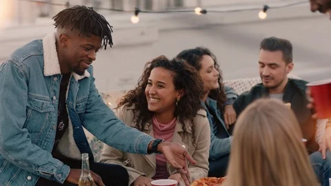 Happy rooftop party friends drinking alcohol having fun on weekend social Stock Footage 99072015