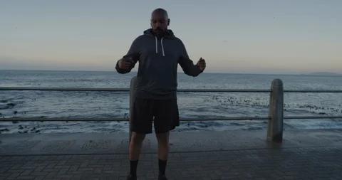 Happy runner man dancing celebrating successful fitness goals cheerful black Video stock 92772034