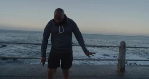 Happy runner man dancing celebrating successful fitness goals cheerful black Video stock 92772078