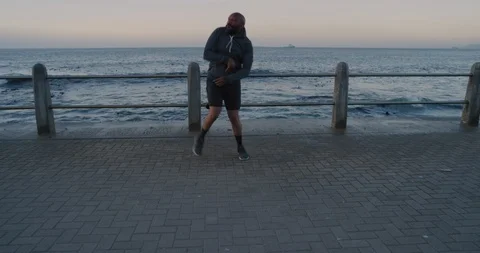 Happy runner man dancing celebrating successful fitness goals cheerful black Video stock 92772111