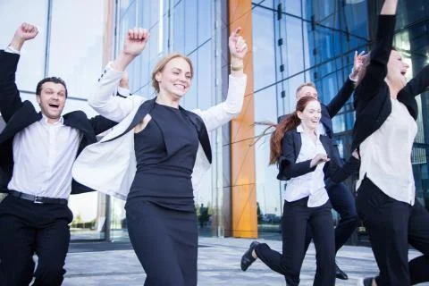 Happy running business people Stock Photos