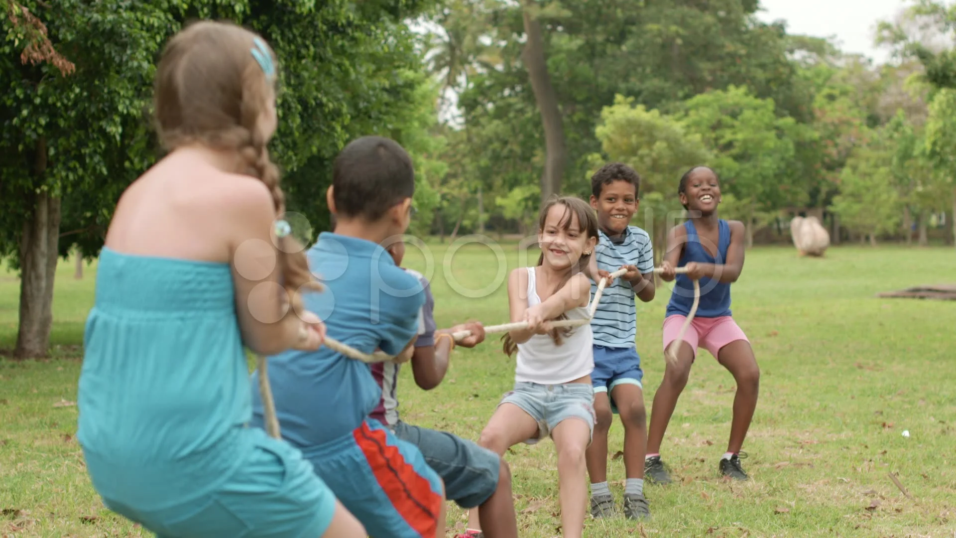 Tug of war children new arrivals