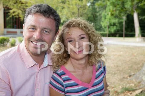 Happy senior couple in love. Park outdoors. Stock Photos