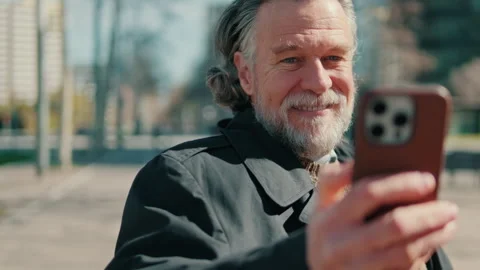 Happy Senior Man Taking a Selfie in the City Stock Footage 320377268