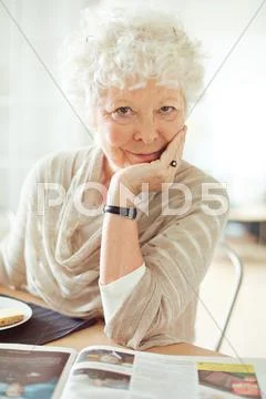 Happy senior woman looking at you Stock Photos