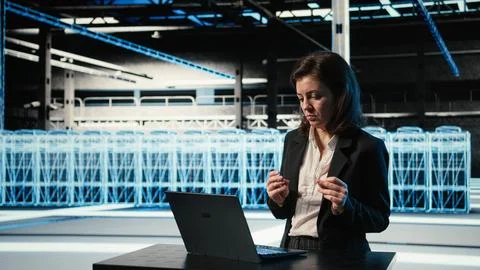 Happy server hub engineer dancing in celebration after fixing system errors Stock Photos