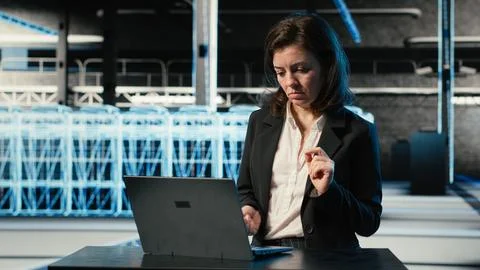 Happy server hub engineer dancing in celebration after fixing system errors Stock Photos
