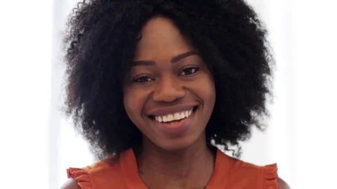 Happy smiling african american young woman face Stock Footage