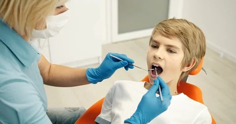 Happy Smiling Boy at Dentist 動画素材 116625464