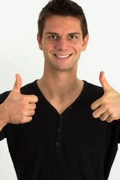 Happy smiling man doing two thumbs up Foto stock