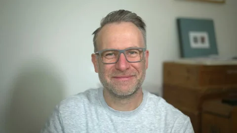 Happy smiling middle-aged man looking to the camera wearing glasses Stock Footage 152035774