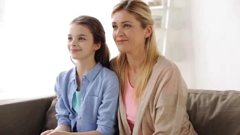 Happy smiling mother and girl at home Stock Footage