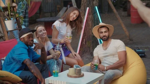 Happy smiling multi-race attractive friends chilling together posing on camera Video stock 114928674