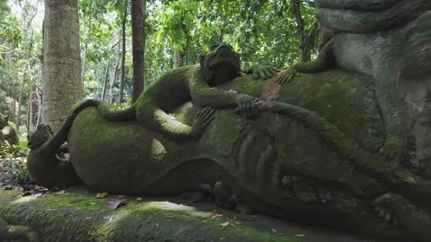 Happy smiling statue in the Monkey Forest. Ubud, Bali, Indonesia. Stock Footage 271567396