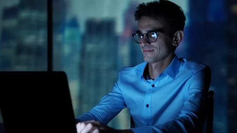 Happy, Smiling Trader Using Laptop, Working with Stock Markets, Online, Earning Stock Footage 93295995