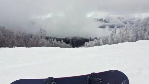 Happy snowboarder taking selfie send greetings outdoors on snowy mountain, .. Stock Footage 342963885
