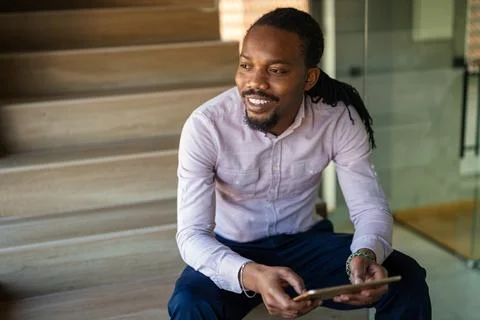 Happy software developer man working on project. Programming advanced code .. Stockfoto's