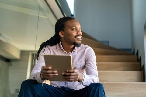 Happy software developer man working on project. Programming advanced code .. Stockfoto's