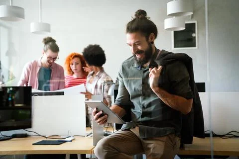 Happy software developers working on meeting, Programming advanced code Photos