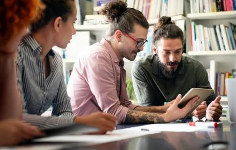 Happy software developers working on meeting, Programming advanced code art.. 库存照片