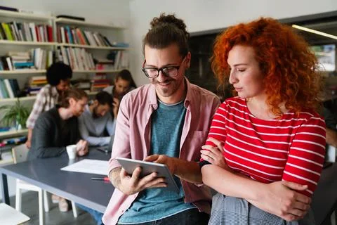 Happy software developers working on meeting, Programming advanced code art.. Stockfoto's