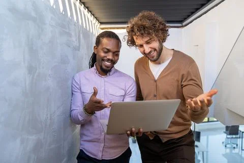 Happy software developers working on meeting, Programming advanced code Stockfoto's