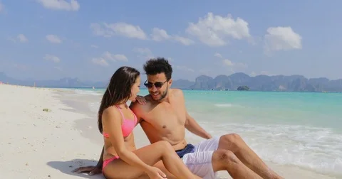 Happy Сouple Sit On Beautiful Beach Talking, Man And Woman In Love Stock Footage