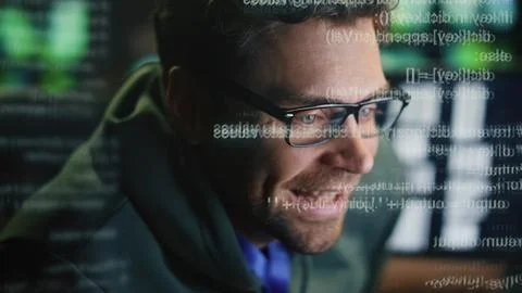 Happy specialist creating code at data hologram closeup. Smiling man programming 스톡 사진