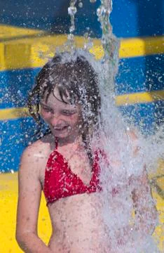 Happy splashing Stock Photos
