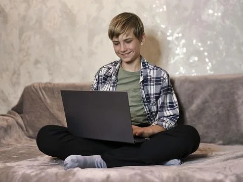 A happy student does his homework Stock Photos