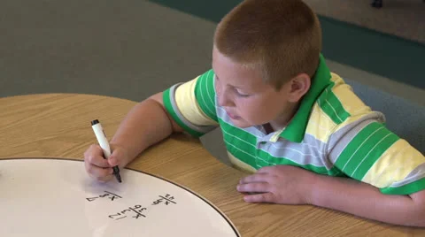 Happy student doing math problem Stock Footage 26585088