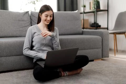 Happy student using laptop Stock Photos