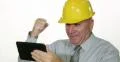 Happy Successful Engineer Man Good News Working Digital Tablet Smiling Portrait 4k or 4k+ Resolution