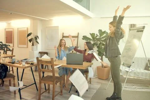 Happy Successful teamwork throwing work year planning paper in the Air. Busin Fotos de archivo