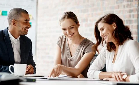 Happy, team and documents in office for meeting, project brief and client p.. Stock Photos