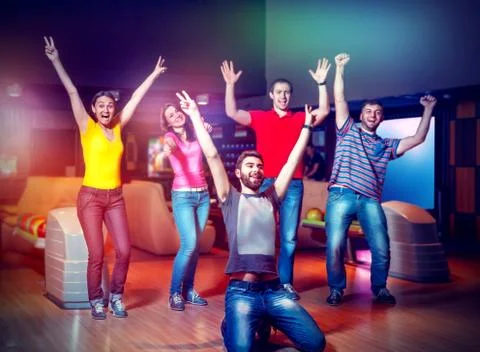 Happy team in bowling Stock Photos