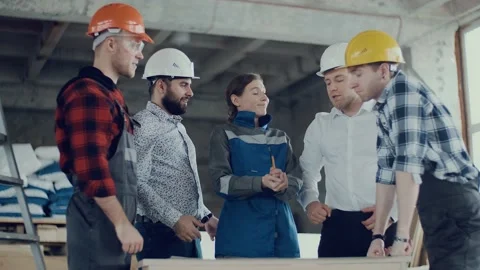 Happy team of civil engineers stack hands put palms together, employees makes Stock Footage 136359402