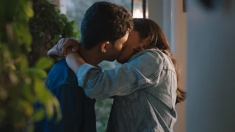 happy teen couple kiss teenage boy kissi... | Stock Video | Pond5